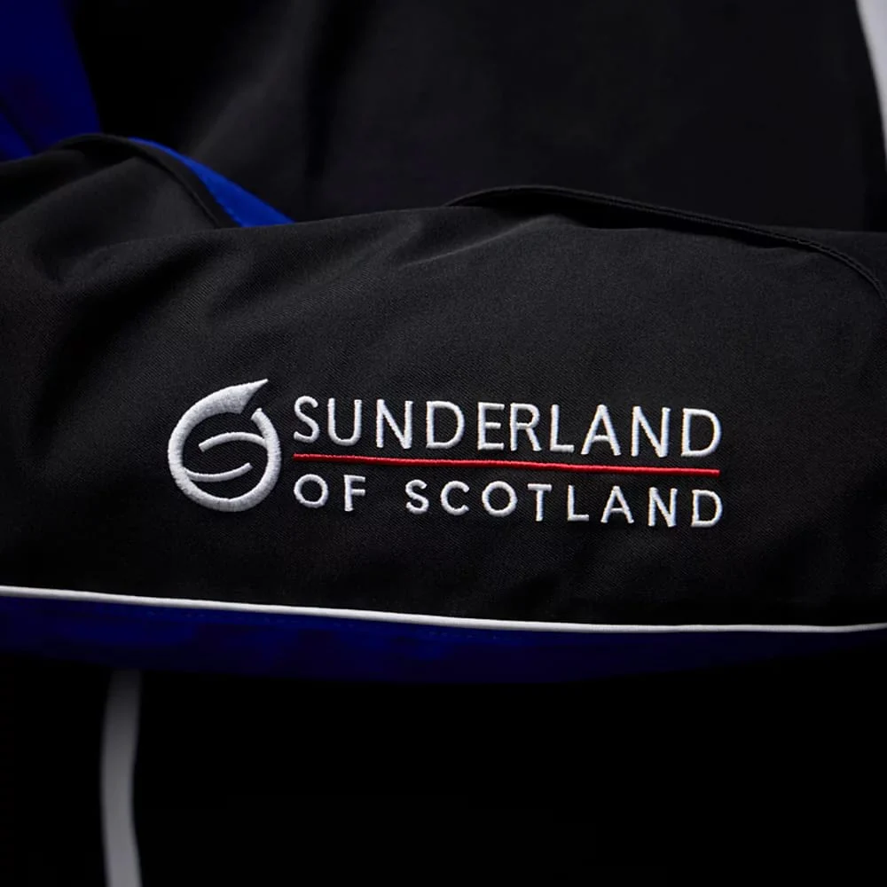 Sunderland Matterhorn Waterproof Golf Jacket - Black/Electric Blue/White - Image 5